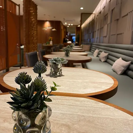 豪斯兹特级套房公寓 酒店